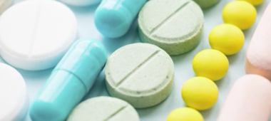 image of various pills lined up